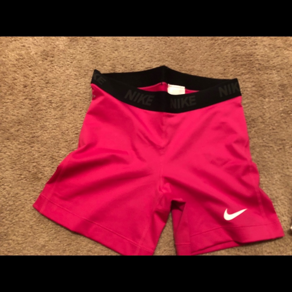 Pink nike dri-fit spandex shorts